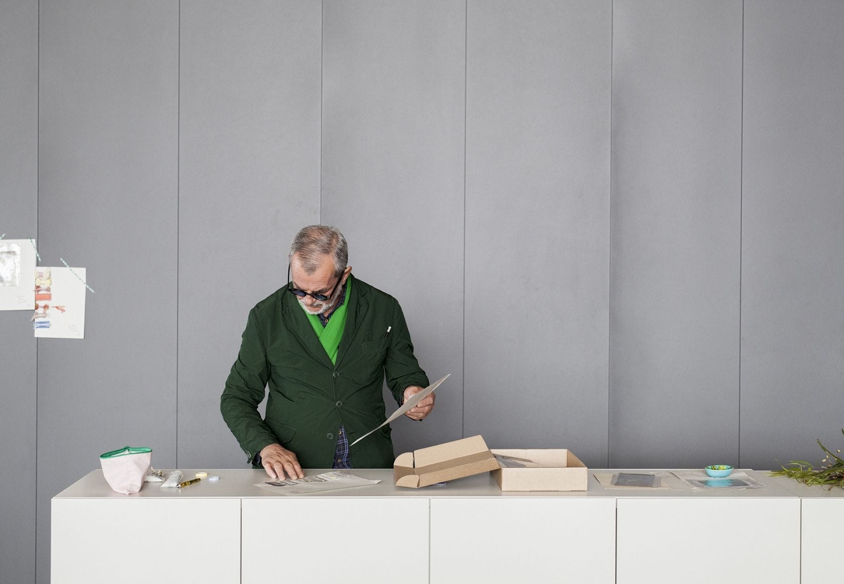 indoors, interior design, adult, male, man, person, head, furniture, table, box