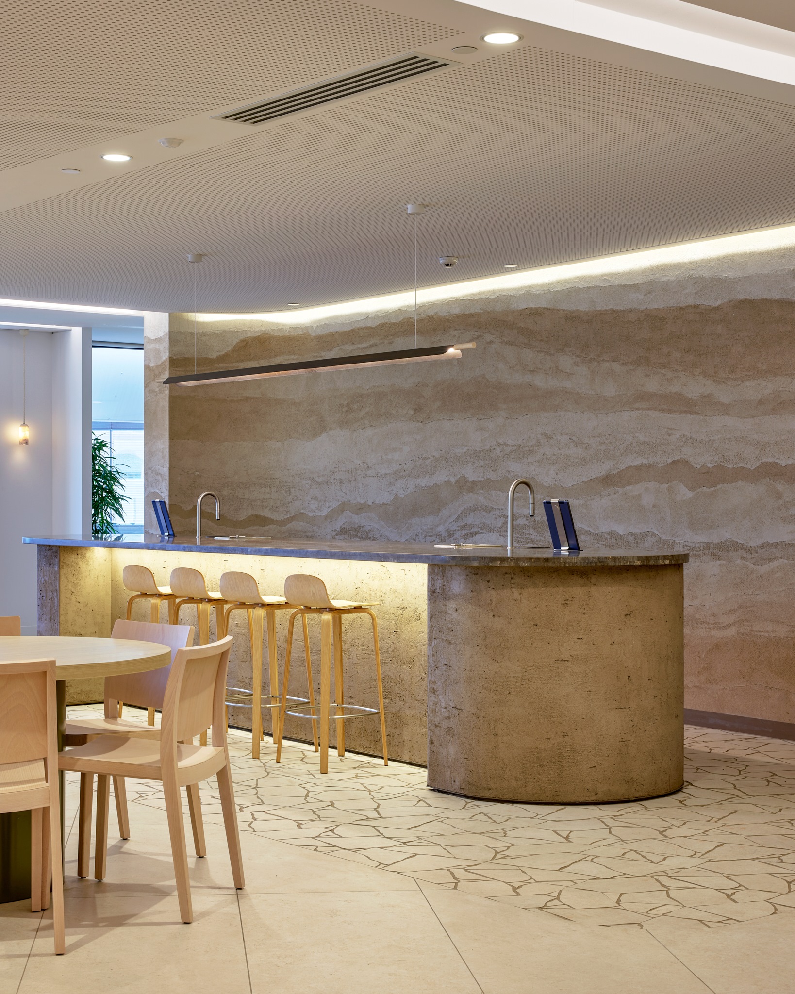furniture, table, indoors, interior design, floor, sink faucet, dining table, restaurant, cafeteria, monitor